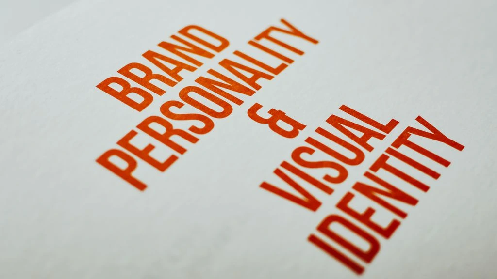 Printed positioning brief on cream cardstock with type specimens